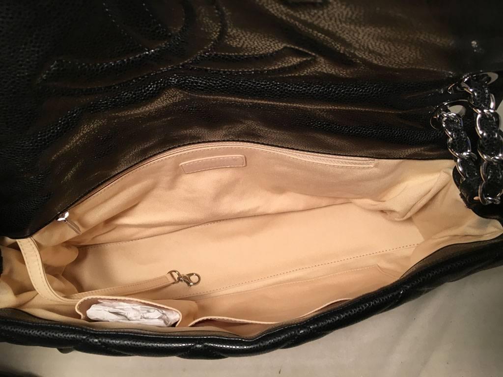 Chanel Black Relaxed Caviar XL Classic Flap Shoulder Bag In Excellent Condition In Philadelphia, PA