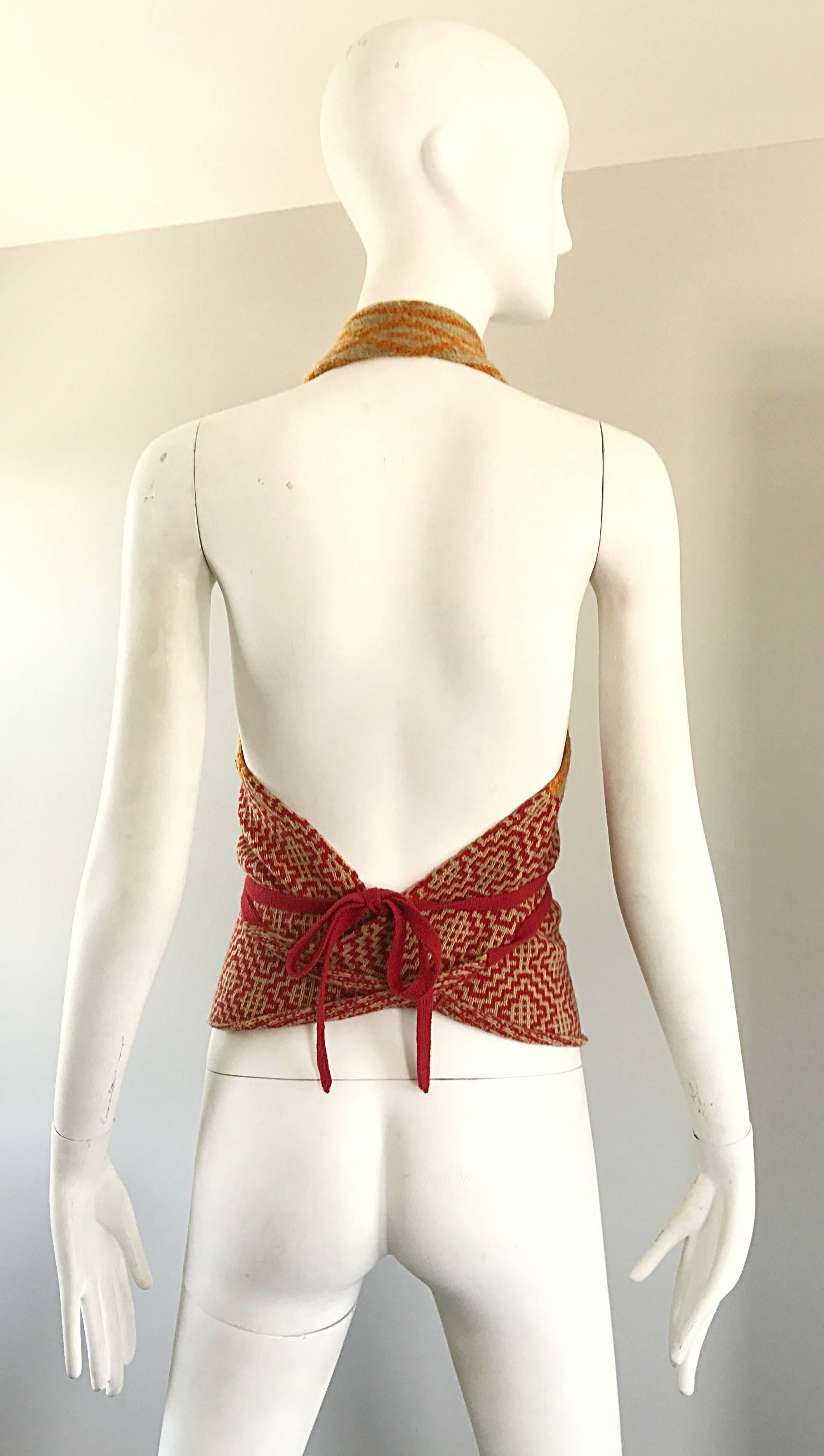 Chic and rare late 1990s DRIES VAN NOTEN wool beaded halter top! Features warm tones of red, gold, tan and marigold throughout. Ikat print in various shapes. Hundreds of hand-sewn seed beads on the bodice. Wrap around style ties shut at the waist.