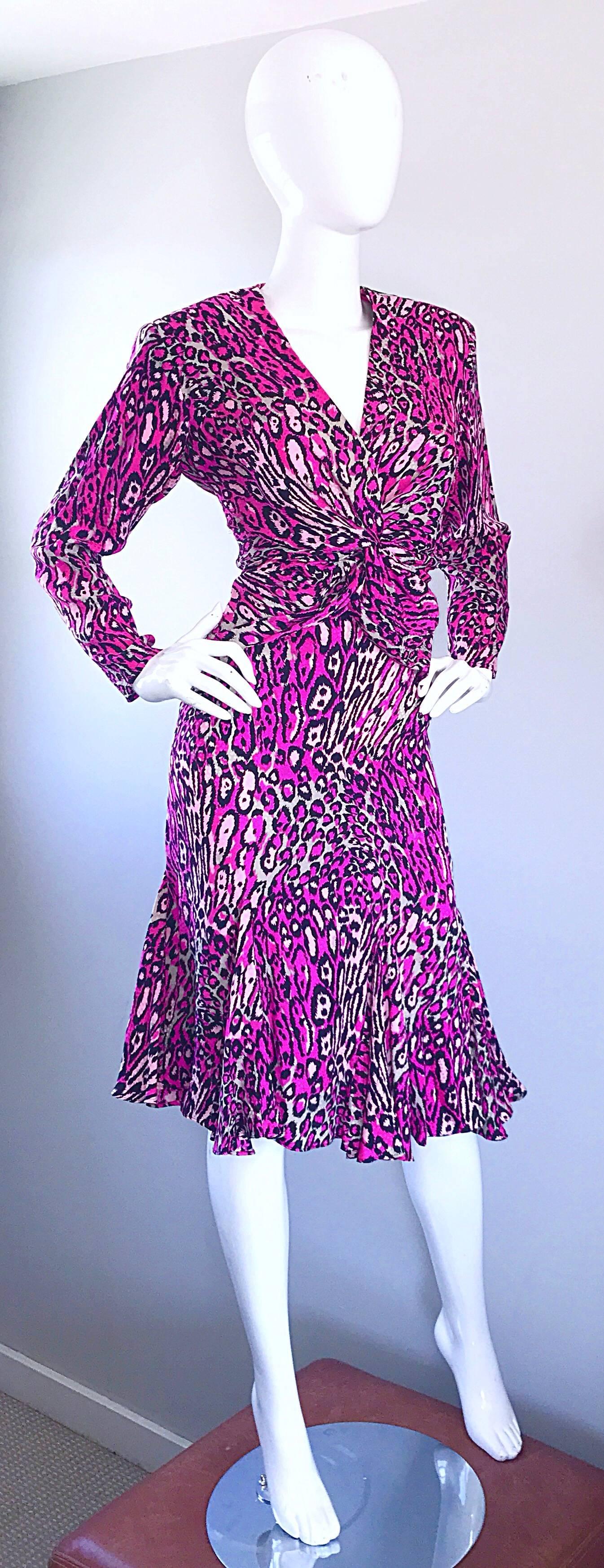 Incredible vintage 1990s FLORA KUNG hot pink fuchsia leopard print silk top and skirt ensemble! Ruched for fitting bodice, with a hidden zipper down the side. Hidden snap at bust. Chic exaggerated shoulder pads can be easily snipped out, if desired.