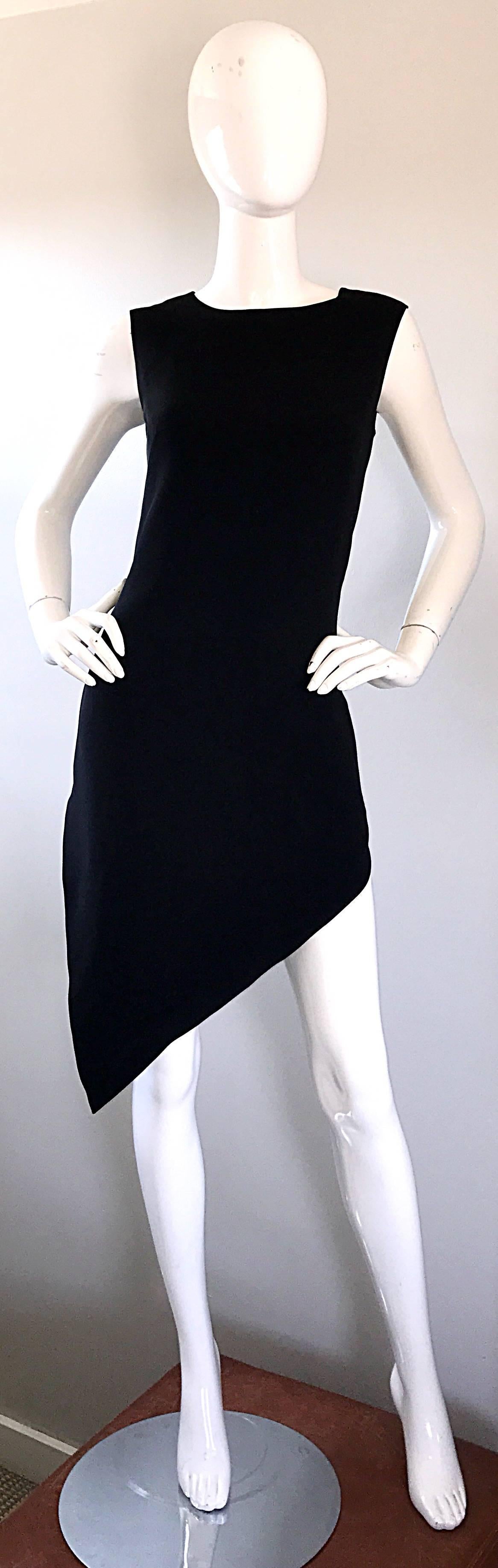 1990s MOSCHINO Cheap & Chic black asymmetrical hi-lo dress! The perfect alternative to the classic little black dress! Flattering and comfortable rayon blend. Shorter on the left side, and longer on the right side. Hidden zipper up the back with