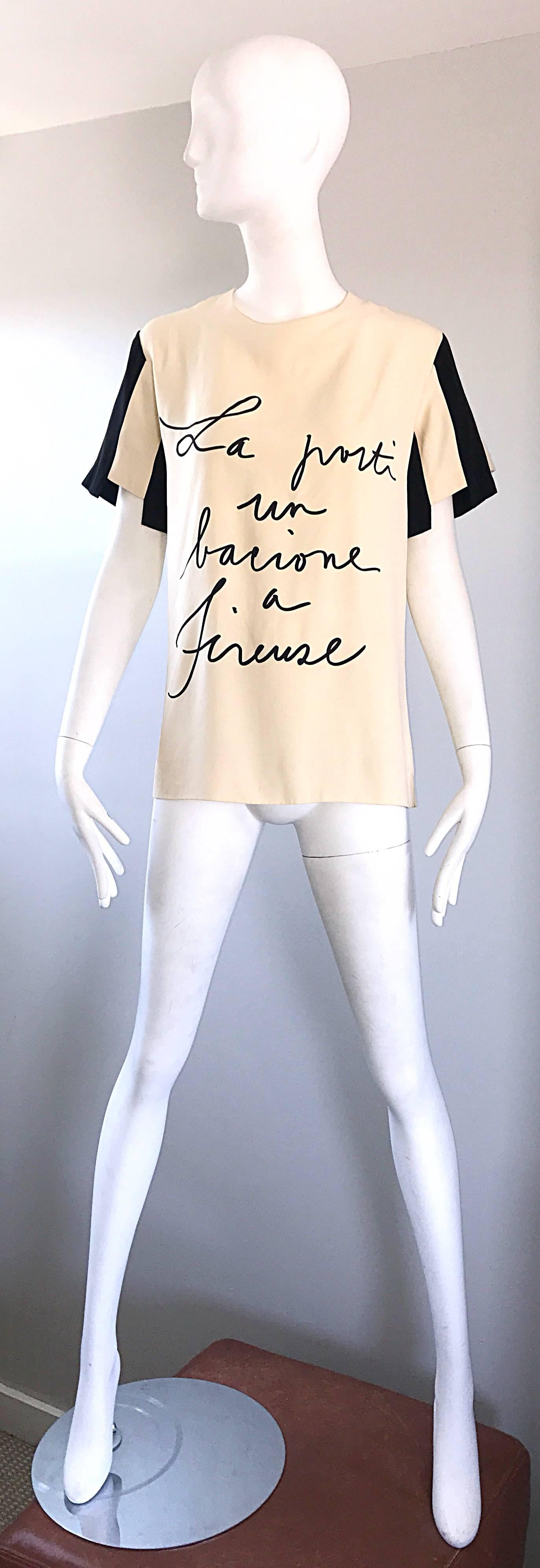 Rare vintage 1990s / 90s MOSCHINO COUTURE novelty black and ivory tunic top! Features the title of the classic song, 