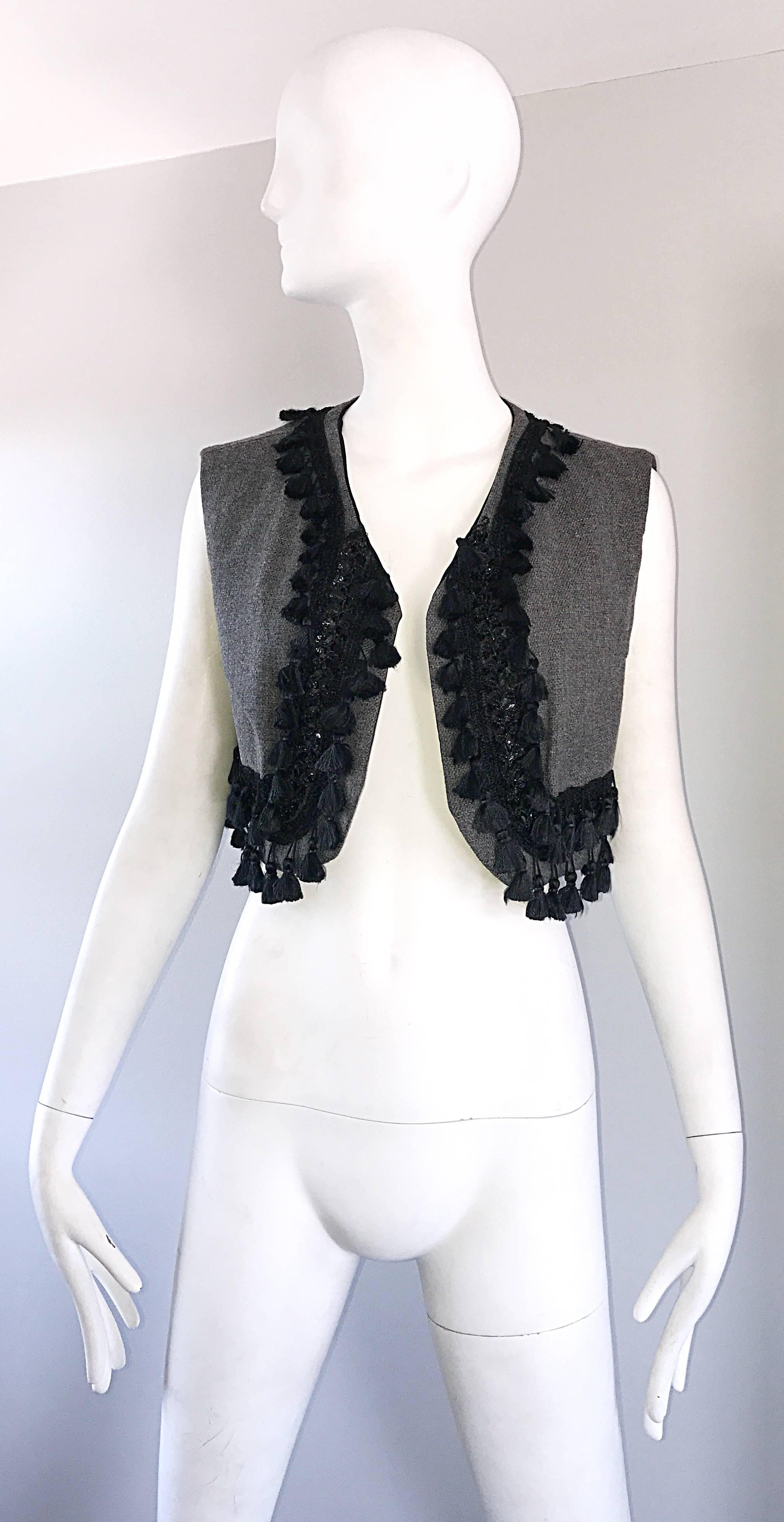 Amazing 60s vintage charcoal grey and black matador style cropped vest! Features intricate Black Russian style embroidery, beadwork, and tassels allover the bodice and back. Label reads, 