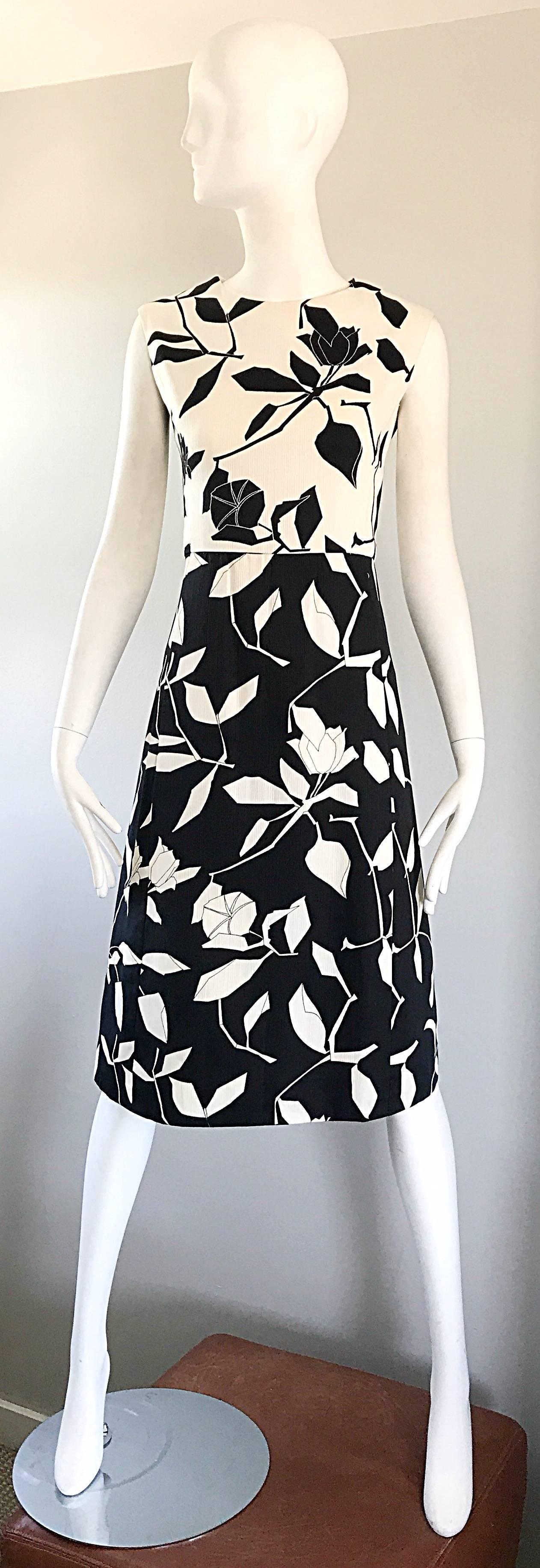 Insanely chic 1960s demi couture black and white abstract flower print A-Line dress! Luxurious cotton and silk fabric. Though no designer label remains, this gem was surely created by a high end designer of the era. Possibly Jeanne Lanvin or Guy
