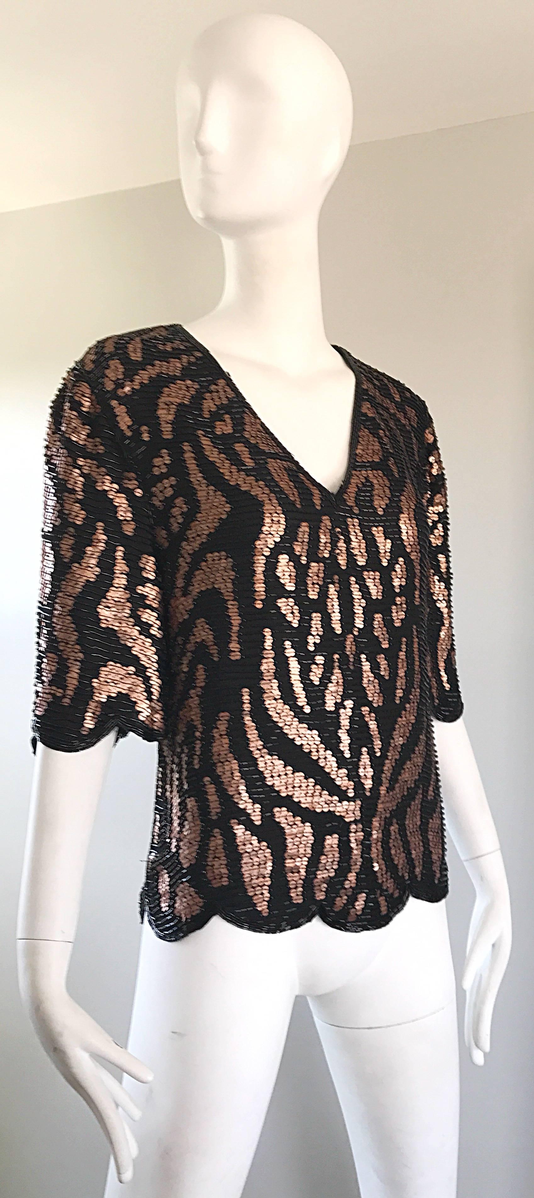 Beautiful vintage 90s JUDITH ANN fully beaded and sequined scalloped silk slouchy flapper top! Features thousands of hand-sewn sequins and beads in black and cooper/bronze. Chic leopard and zebra print through strategically sewn beads and sequins