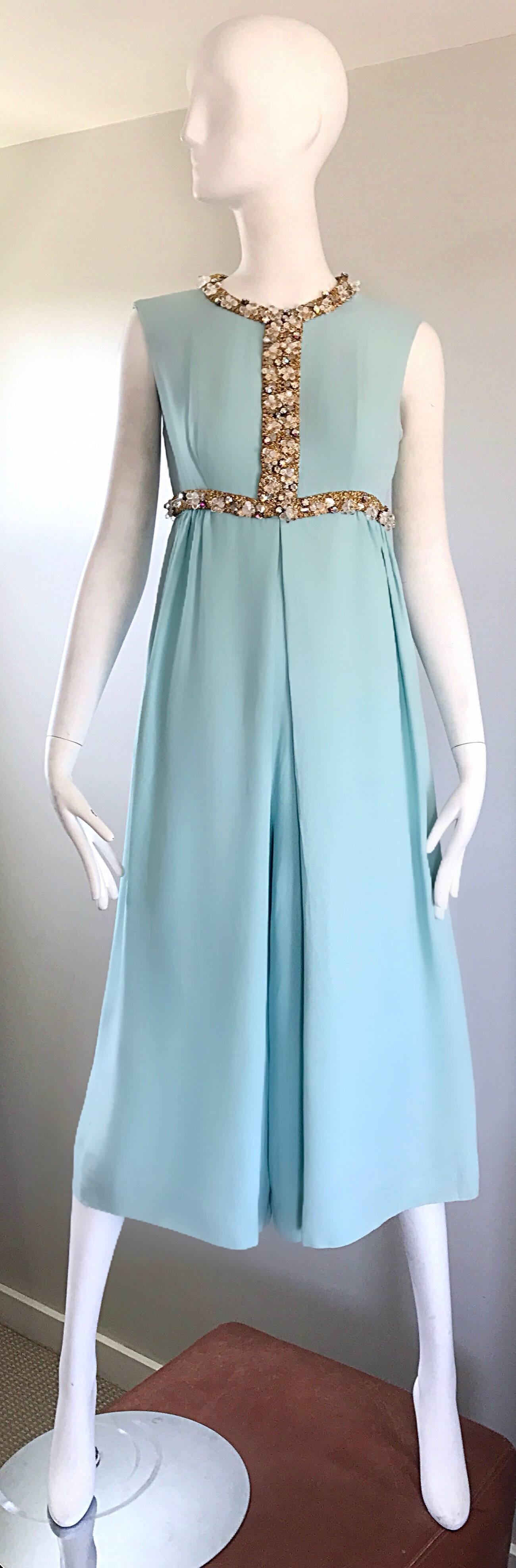 Amazing vintage 60s light blue silk crepe cropped culotte wide leg palazzo jumpsuit / onesie! Features hundreds of hand-sewn rhinestones, sequins and beads along the bodice. Tailored fitted bodice, with chic and forgiving wide legs. Hidden metal