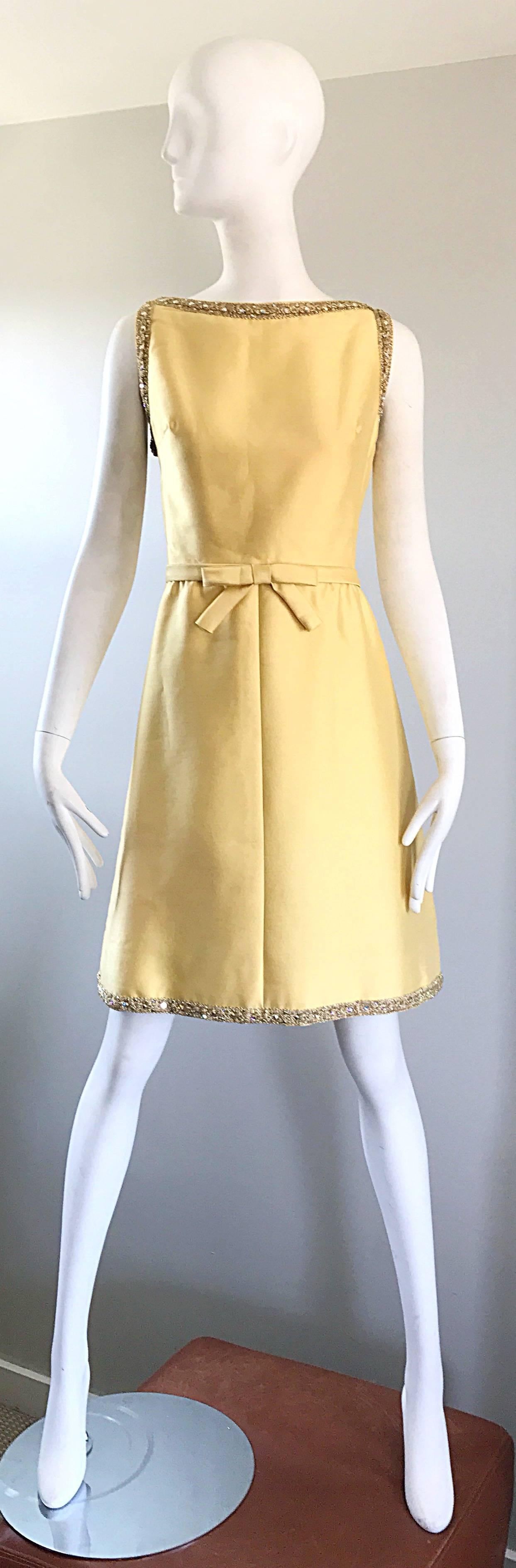 Chic SHANNON RODGERS for JERRY SILVERMAN canary yellow raw silk shantung beaded A-Line dress! Features a flattering boatneck, with a fitted bodice and forgiving full skirt. Bow detail at front center waist. Hundreds of sequins and beads sewn along