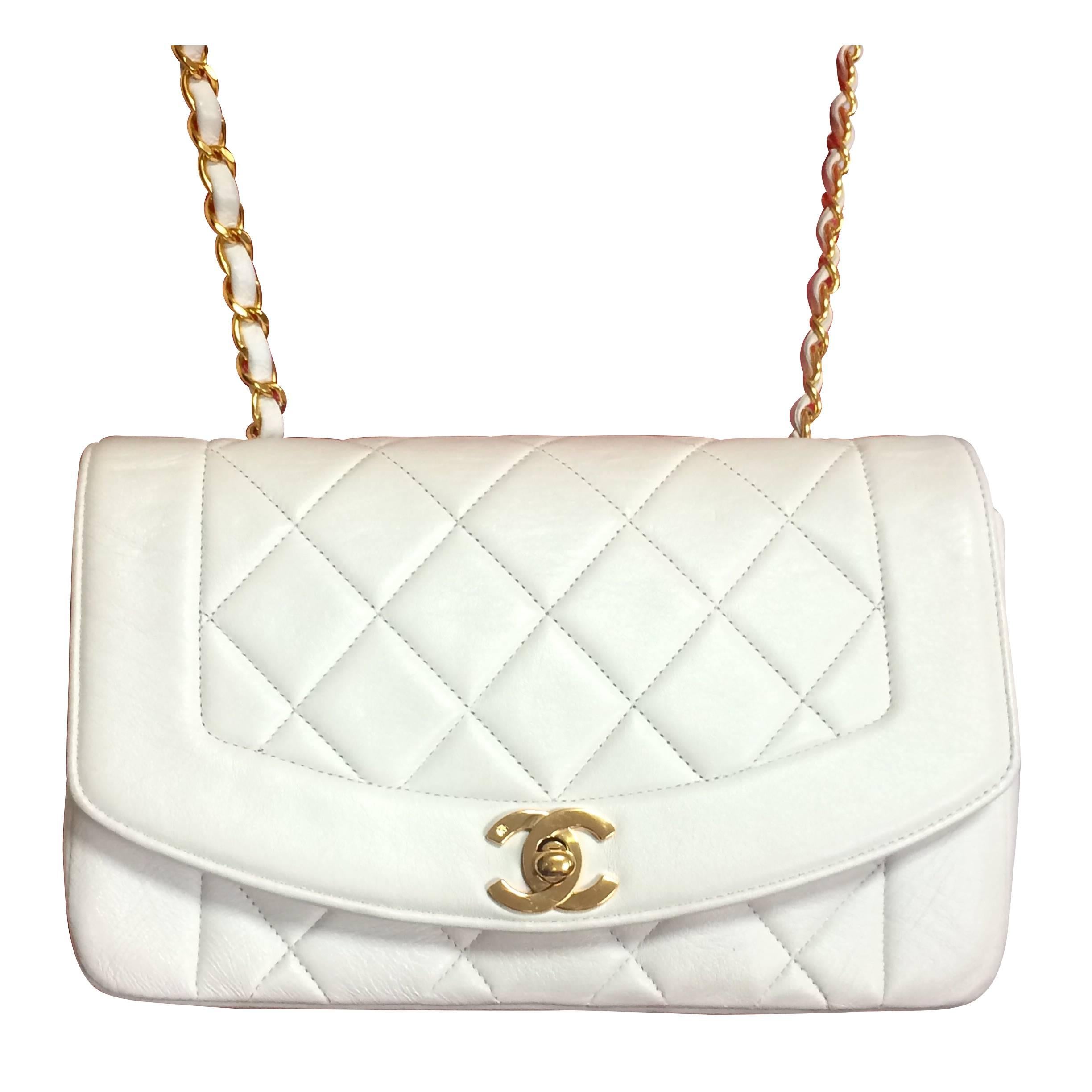 Vintage Chanel classic 2.55 white color lamb leather shoulder bag with gold CC.
