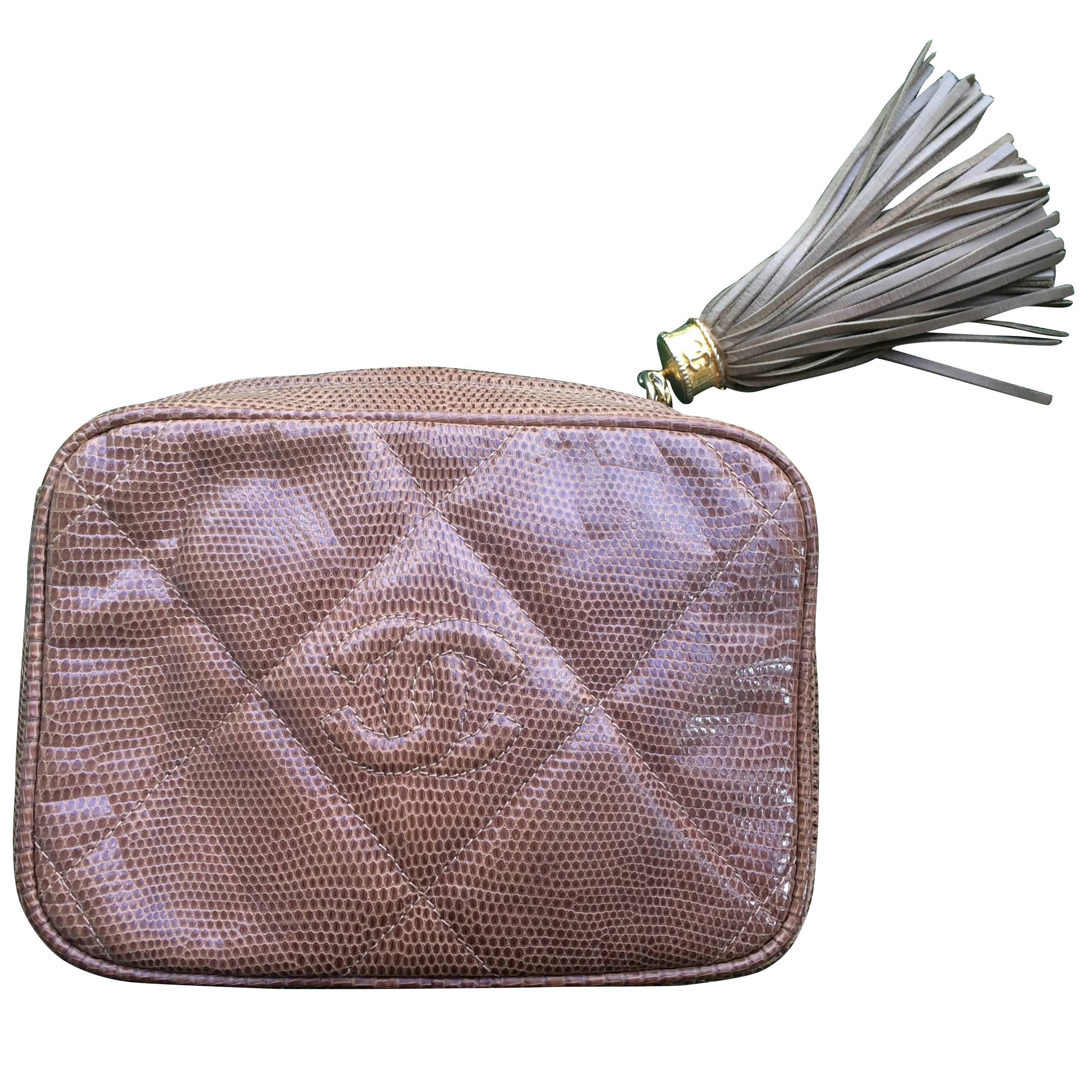 Vintage CHANEL brown lizard camera bag type clutch bag with fringe and CC mark. For Sale