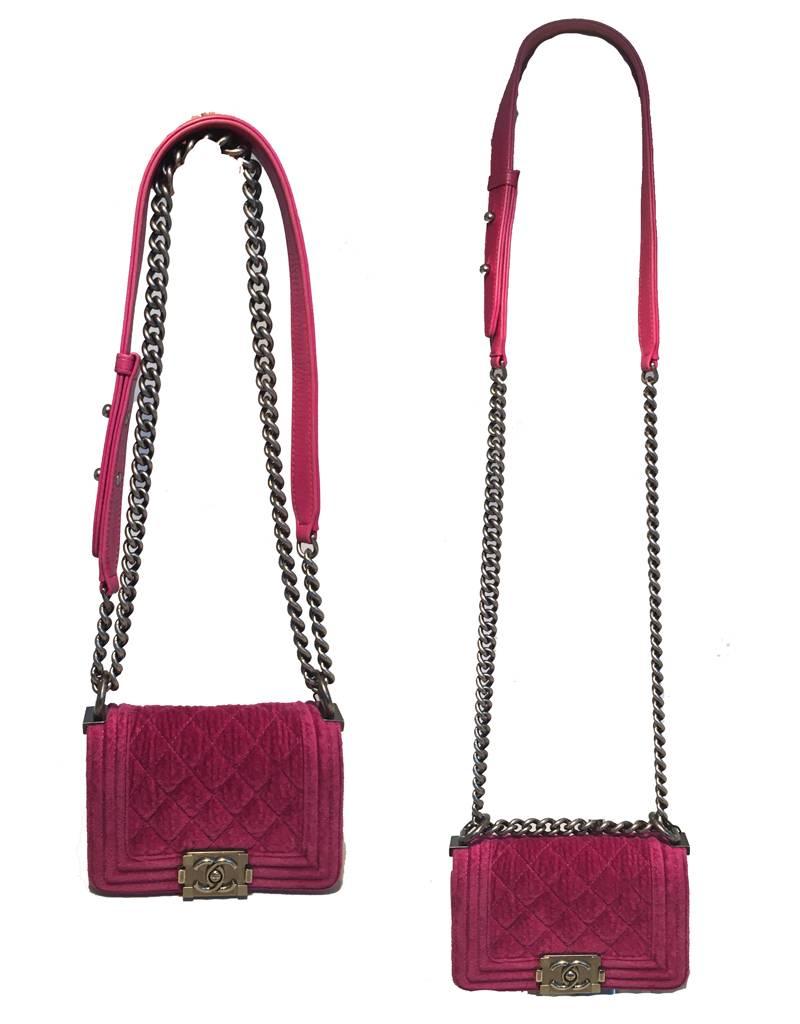 GORGEOUS Chanel magenta velvet extra mini boy bag classic in excellent condition. Original runway sample no longer made or sold. Magenta velvet exterior trimmed with gunmetal hardware in hard to find extra mini classic flap size. chain and leather