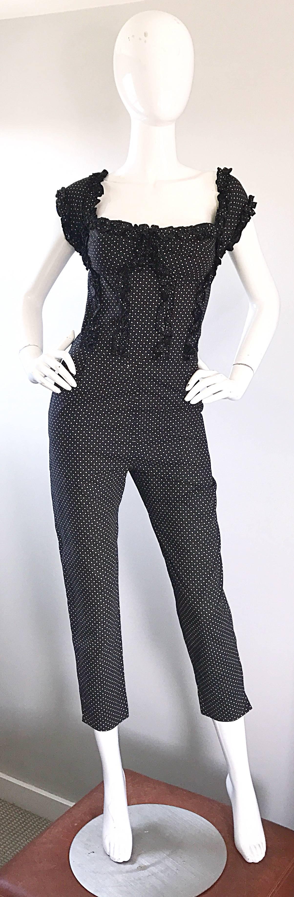 Brilliant 1990s BRIONI black and white / ivory micro flower print cropped cotton jumpsuit! Features a fitted ruffled boned corset top. Slim fitting legs, with a slit at each outer side of the cuff hem. Pockets at each side of the hips. Hidden zipper