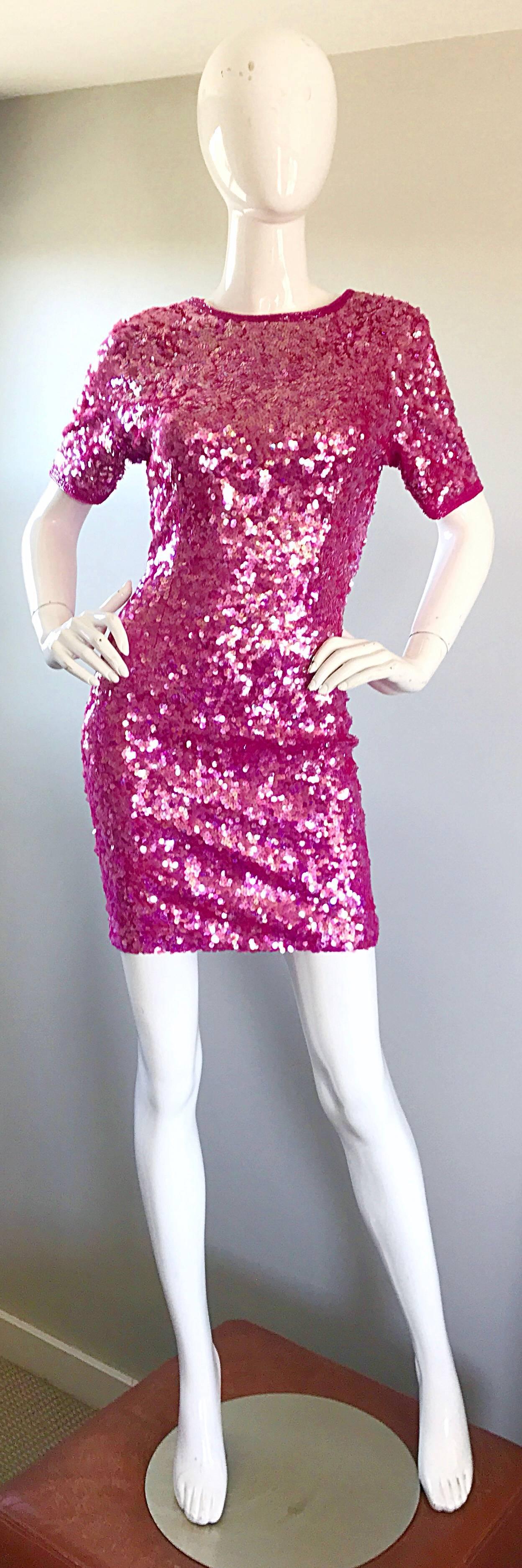 Sexy vintage LILLIE RUBIN 1990s schocking hot pink fully sequined and beaded mini dress! Features thousands of hand-sewn sequin throughout. Pink seed beads line the sleeves and plunging back. Wonderful bodycon fit stretches to fit. Hidden zipper up