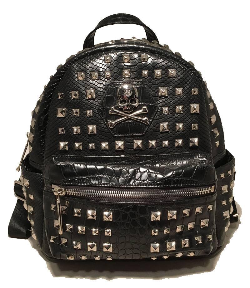 FABULOUS Philip Plein Black Snakeskin Studded Leather Backpack in excellent condition.  Black leather and snakeskin exterior trimmed with silver studs throughout the entire front and sides.  Front zippered pocket. Padded back shoulder straps.  Top