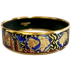 Retro Hermes cloisonne enamel yellow fish in blue, black, red bangle bracele.