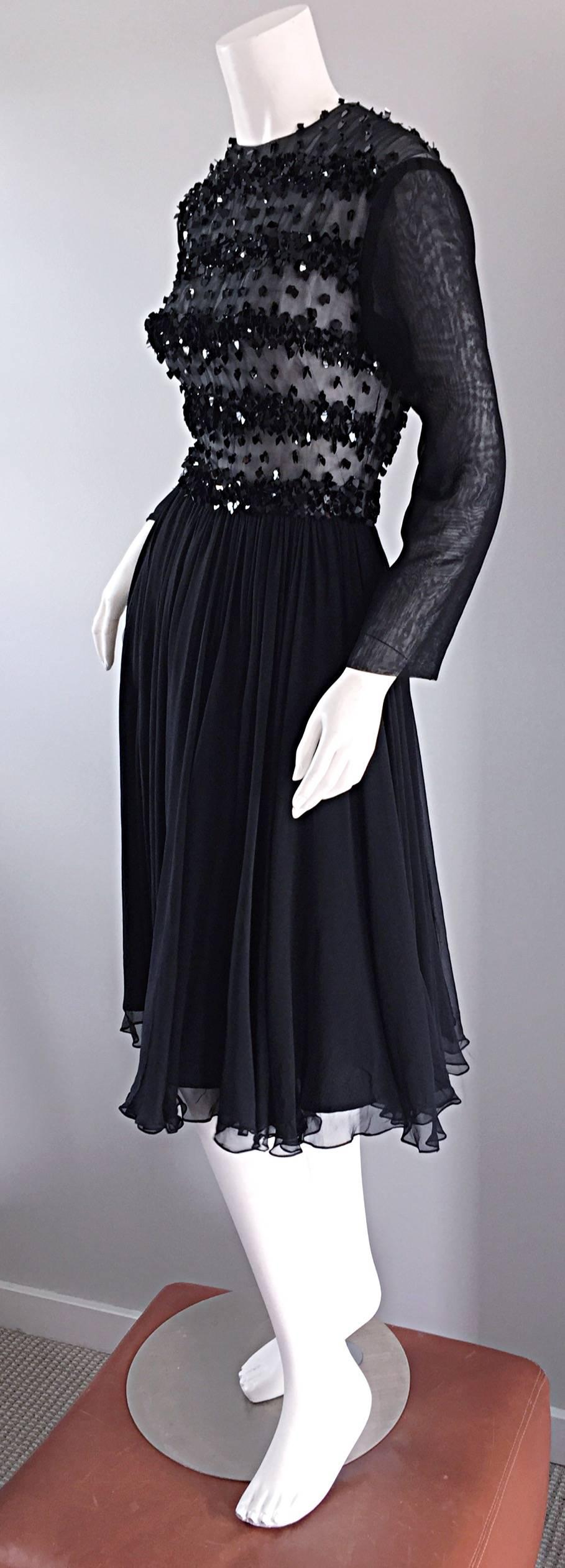 Beautiful 1960ss Pat Sandler for Highlight black silk chiffon dress, with thousands of paillettes! Layers and layers of black silk chiffon on the skirt, that looks absolutely breathtaking on! Black shiny paillettes throughout the entire front and