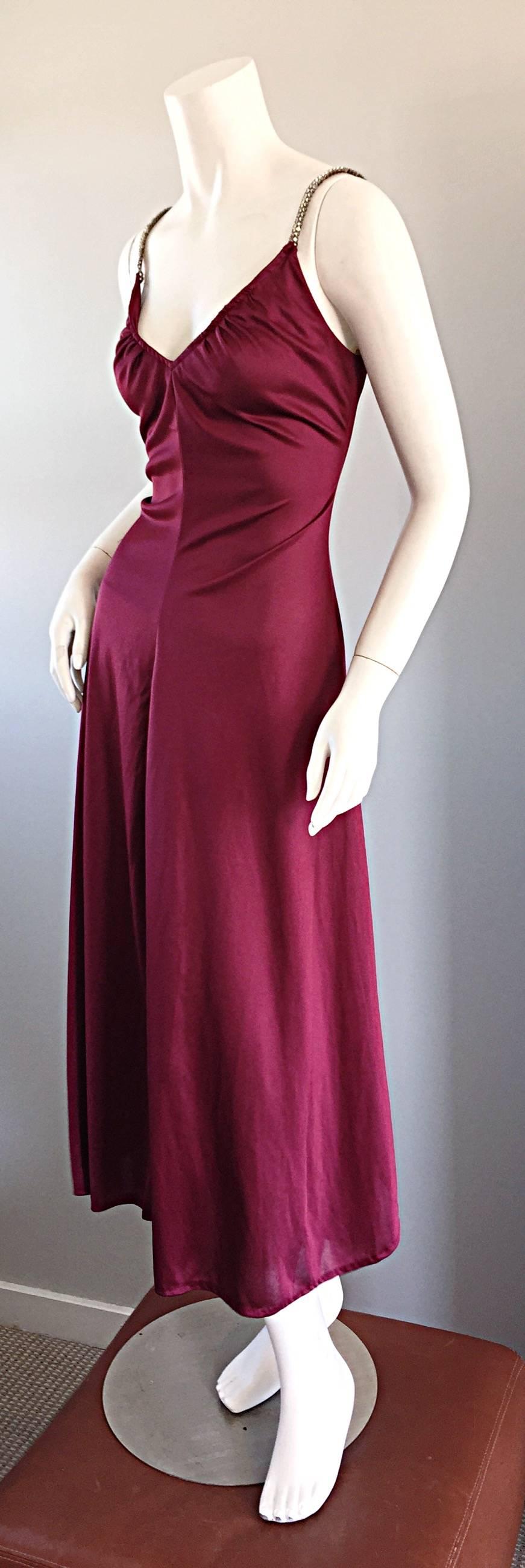 Sexy 1970s Joseph Magnin disco dress!!!! Rich burgundy wine color, with rhinestones encrusted on straps. Ruched bodice, that is so flattering on! Slinky skirt,with slit up the side. Looks great alone, or belted. Perfect with sandals, wedges, boots,