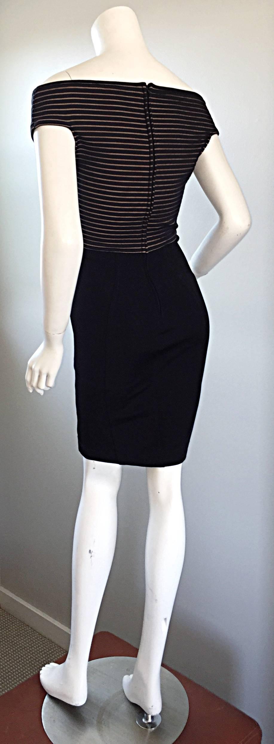 Sexy 1990s Tadashi Shoji dress! Black stretch that hugs the body in all the right places! Black, with nude peeks of fabric in between at the bust, which evokes just the right amount of sex appeal! Sits slightly off the shoulders. This is SUCH a
