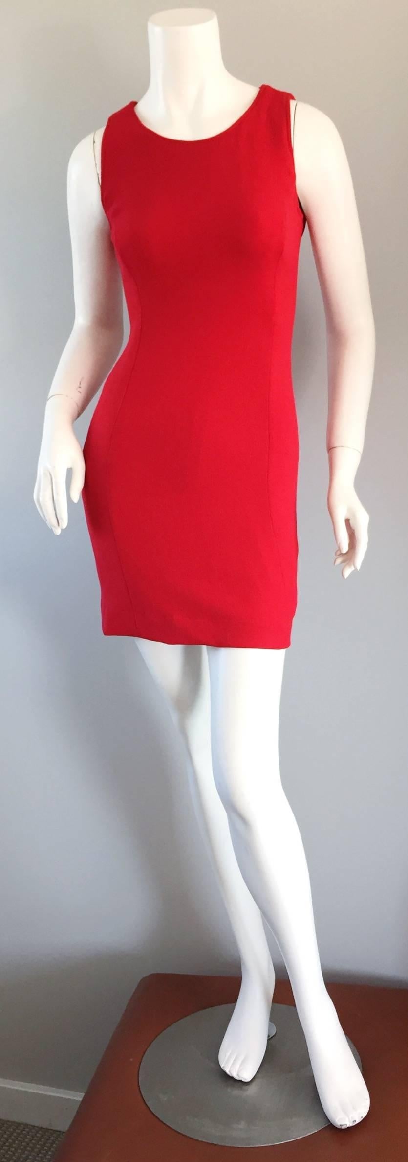 Sexy, yet sophisticated vintage Armani Collezioni red body con dress! Hug the body in all the right places, with slimming seams. Honestly, the PERFECT little red dress! A true knock-out! Can be used for so many different occasions! Great alone, yet