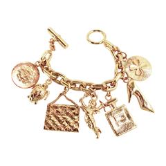 Vintage Chanel Famous Collectible 7 Charms Bracelet