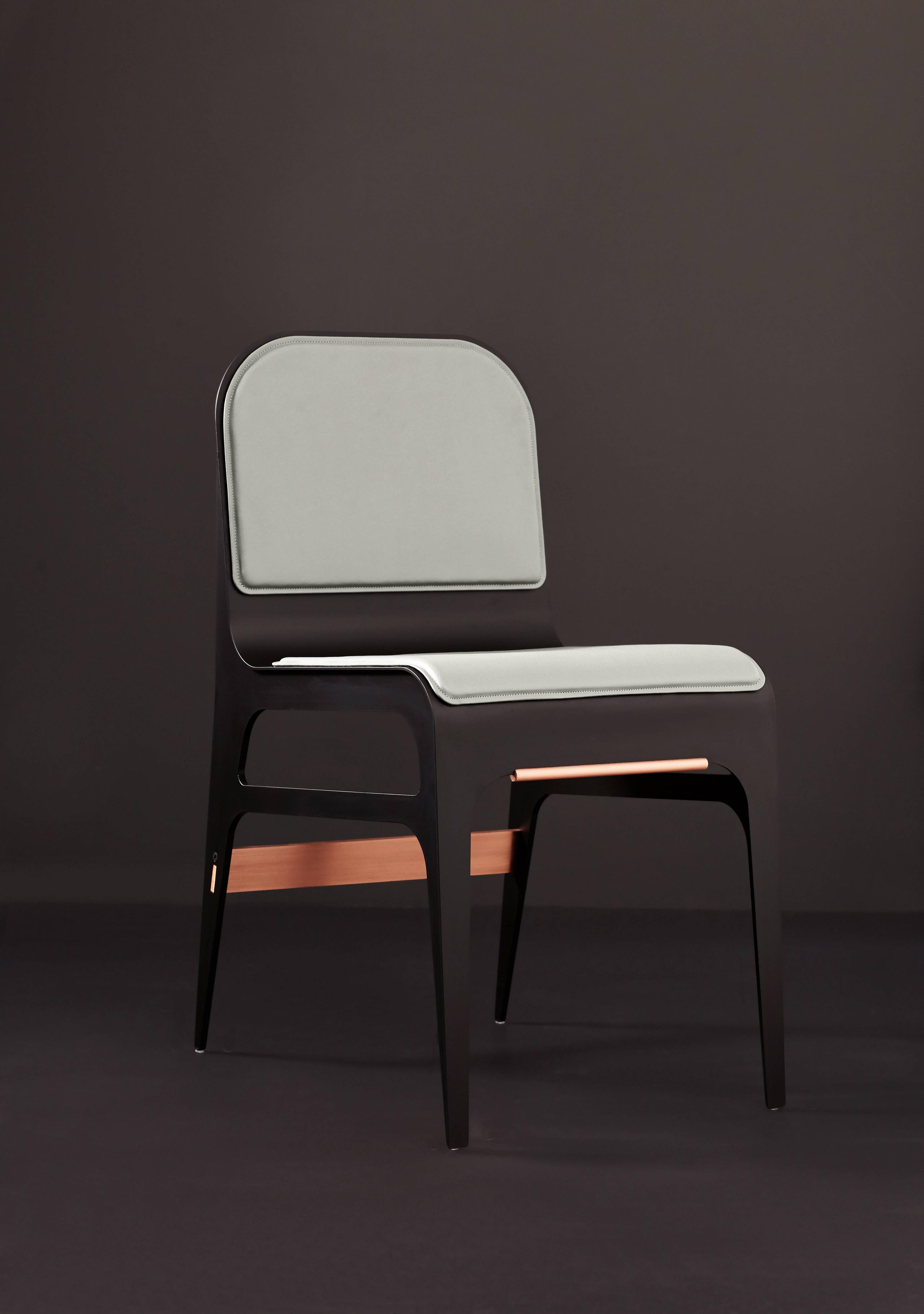 black and copper dining chairs