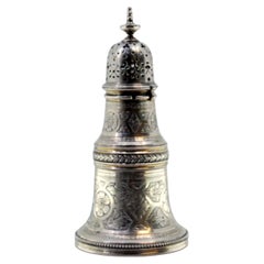 Silver sprinkler with chiseled acanthus flowers, leaves, and rim friezes