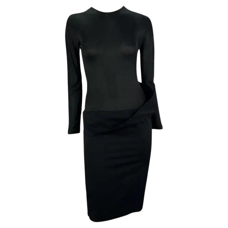 F/S 1998 Alexander McQueen
Golden Shower
Schwarzes langärmeliges Eulenkleid mit langen Ärmeln