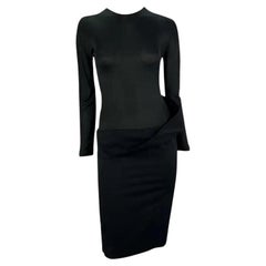 F/S 1998 Alexander McQueen
Golden Shower
Schwarzes langärmeliges Eulenkleid mit langen Ärmeln