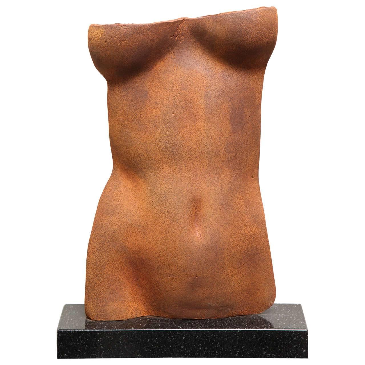 Torso is a classic motif today and  in the Hellenistic Time.
This Cast Iron Torso on Granite Base is edition 9 of 10.
The sculpture is the perfect &quot;Gods of Small Things&quot;. Rare and unique.