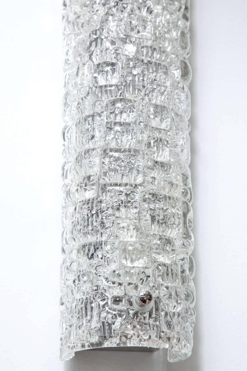 Fantastic pair of croco embossed crystal sconces with polished nickel hardware by Orrefors.