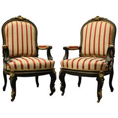 Antique Pair of French Louis XIV Style Ebonized and Ormolu Bergeres, circa 1880
