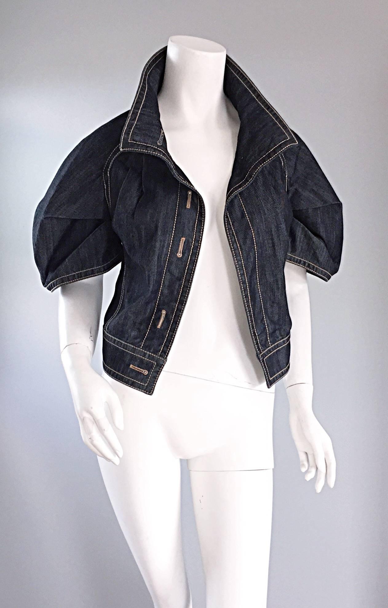 Chic Early 2000s ESCADA short sleeve denim jacket! Features origami-like pleating detail at sleeves, with mock button holes down front bodice. Elegant, with a slight edge. I love the look of this paired with a long sleeve turtleneck, or over a