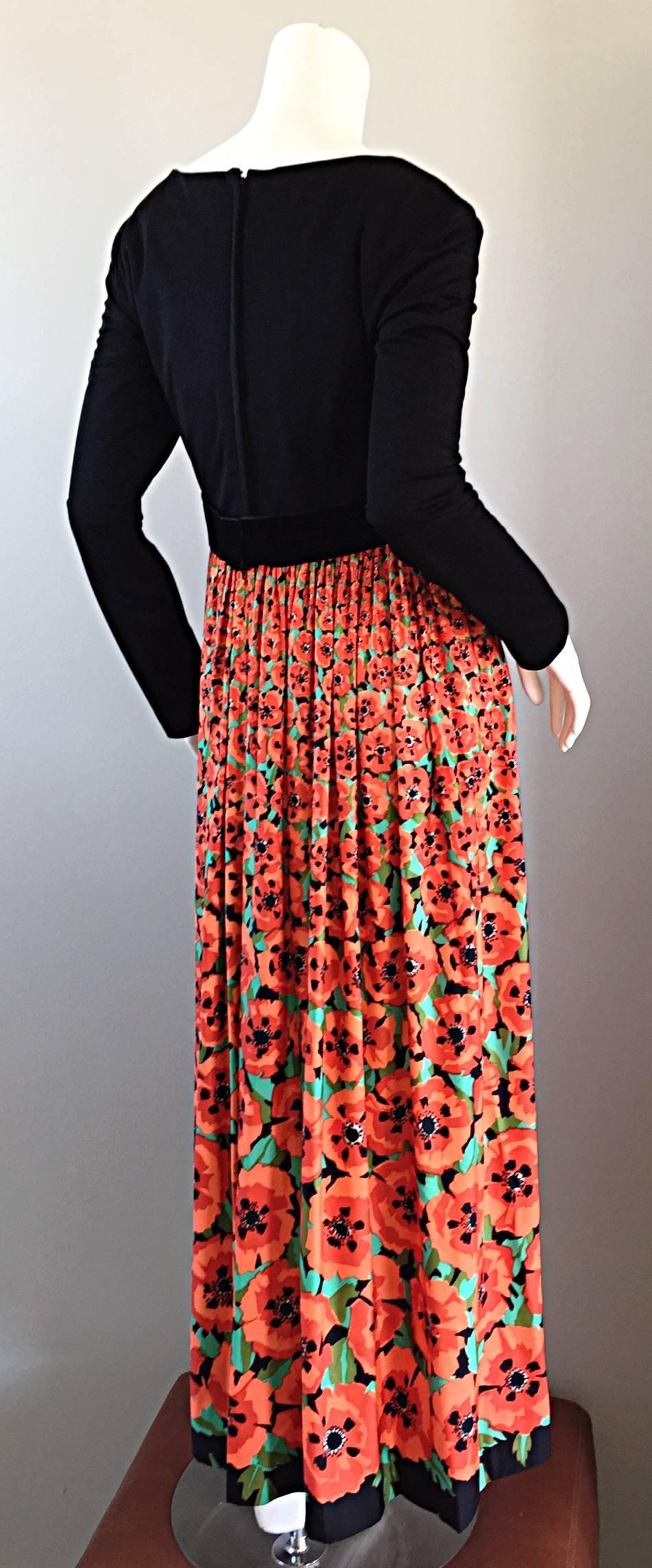 Beautiful vintage Joseph Magnin maxi dress! Jet black bodice, with 3-D 'hibiscus' printed maxi skirt. Hibiscus flowers start out small at waist, ending in oversized printed flowers at bottom. Chic long bow at waist, with hook-and-eye closure at back