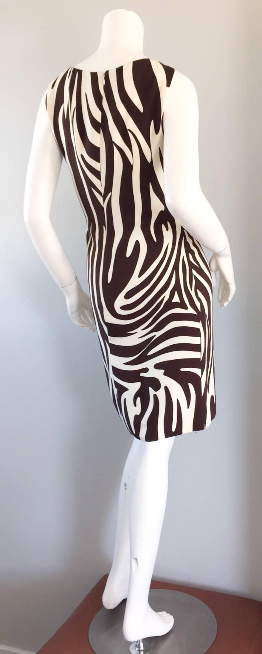 THe ultimate chic vintage Bill Blass dress! Featured on the runway for Fall/Winter 1992, this chic ivory and chocolate brown zebra print dress looks amazing on! So figure flattering!!! Slit up the side. Looks great alone, or belted. Hidden zipper up