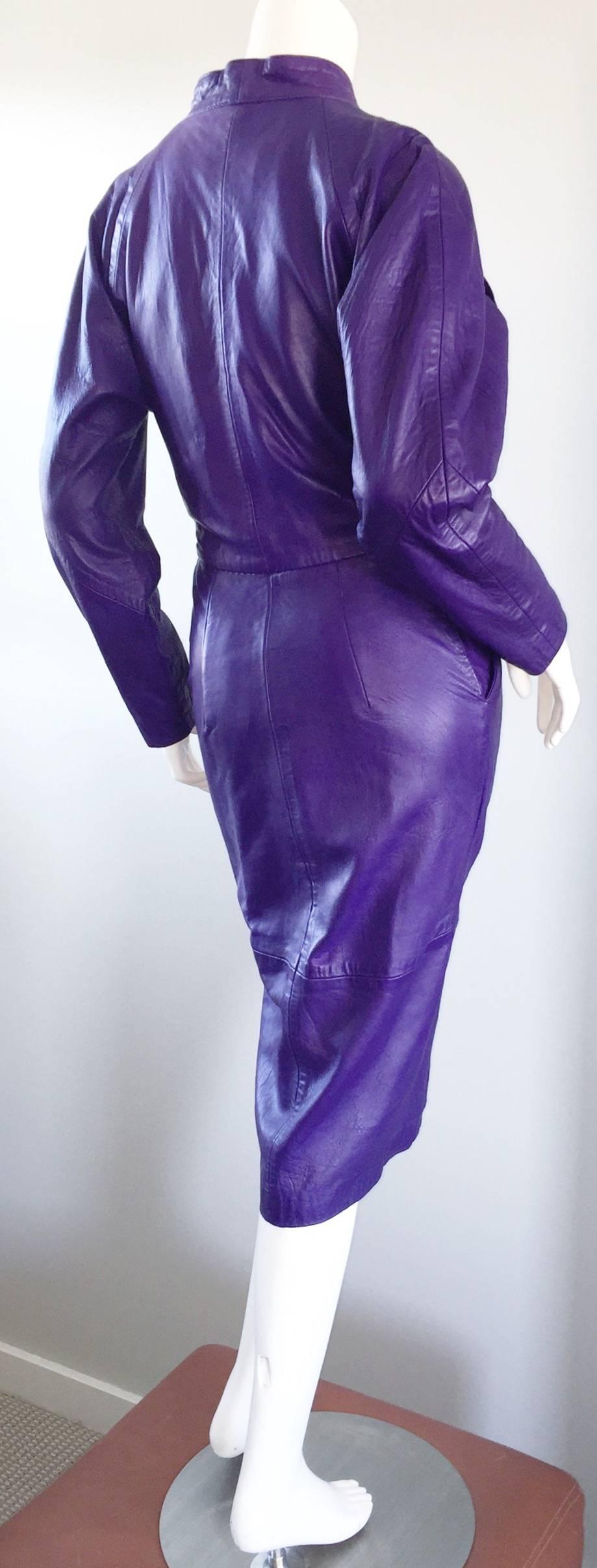 Sexy vintage North Beach Leather purple dress/jacket, designed by Michael Hoban! Snaps up the front, so can easily be worn as a sexy body con dress, or left open as a jacket. Intricate stitching detail at sleeves, which are dolman sleeves. Great