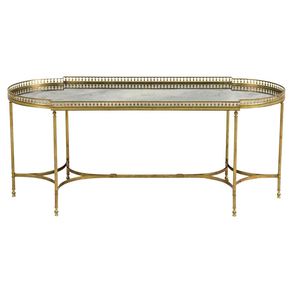 Table basse ovale de style Hollywood Regency française, en verre fumé et laiton
