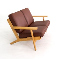 2020s Hans J. Wegner for Getama Two Seat Sofa in Oak with Leather Cushions
