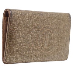Chanel Gold Leather Timeless CC L Yen Wallet