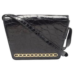 Gucci Borsa a tracolla con patta GG in pelle di coccodrillo nera