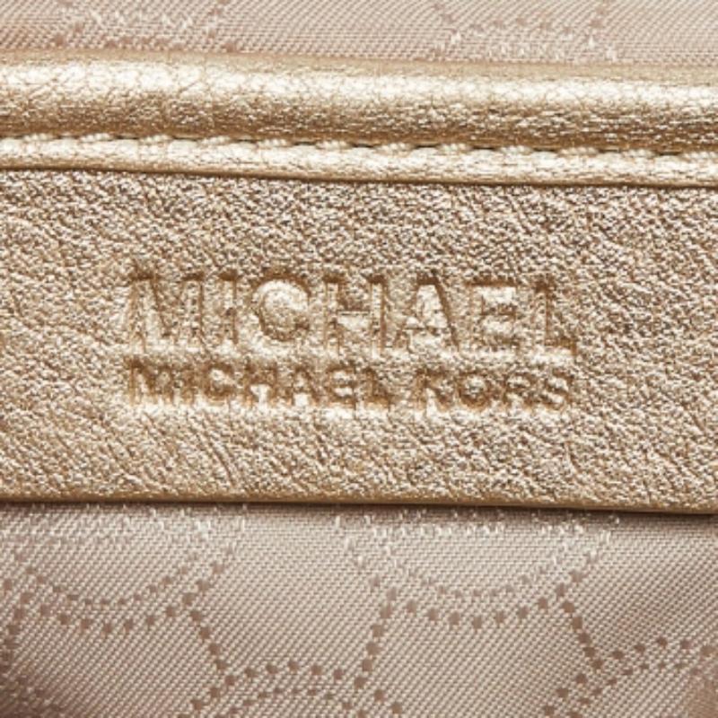 Oro Michael Kors - Borsa con coulisse Frankie in pelle oro in vendita