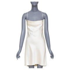 SAINT LAURENT 2022 Robe de mariée mini-combinaison en soie ivoire, col bénitier et dos nu, taille FR38 M