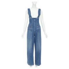 PHILOSOPHY DI LORENZO SERAFINI – Jumpsuit aus Denim mit tiefem Ausschnitt, Reißverschluss vorne und weitem Bein