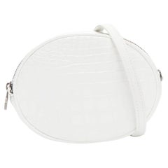 FERIDA YANG Emma white matte scaled leather oval crossbody belt bag