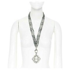 CHANEL black triple strand pearl strass crystal clasp CC pendent necklace