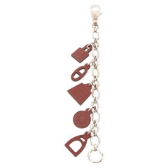 HERMES Breloque Olga Amulet dark brown leather charms silver bag chain