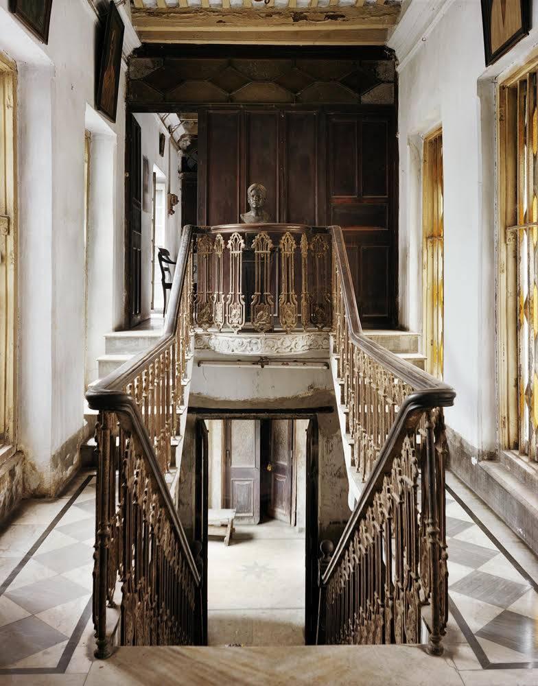 Laura McPhee Color Photograph - Stairwell, Monmotho Ghosh House, North Kolkata