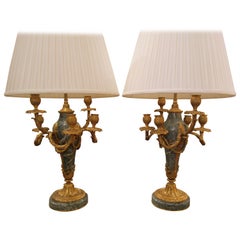 A  pair of signed 19th c  Louis XVI marble and gilt bronze lamps by Thiebault
