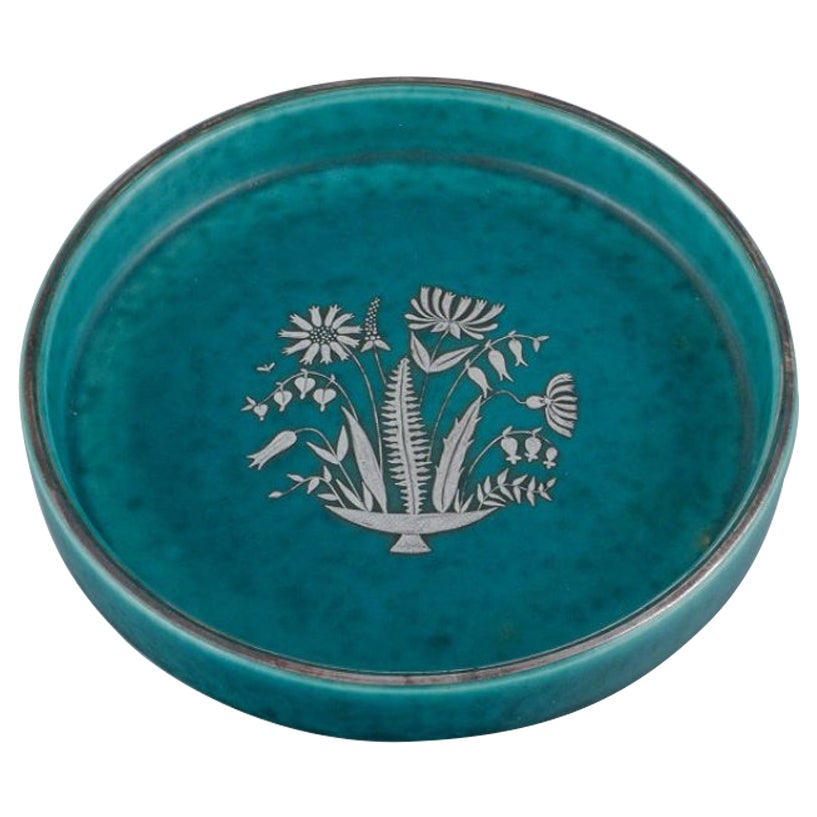 Wilhelm Kåge for Gustavsberg. Low Art Deco ceramic bowl with silver decoration For Sale