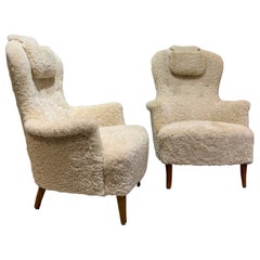 Pair of Carl Malmsten armchairs in sheepskin Sweden circa 1950