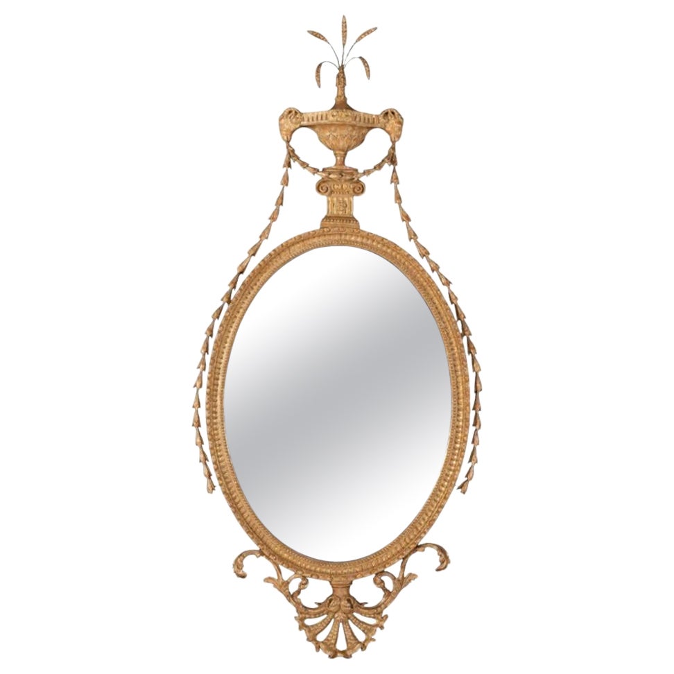 A Fine George III period giltwood oval mirror attributed to John Linnell