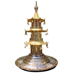 A Monumental part-gilded sterling silver and engraved glass rotating centrepiece