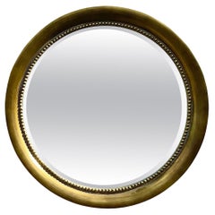 Miroir circulaire doré vintage Regency